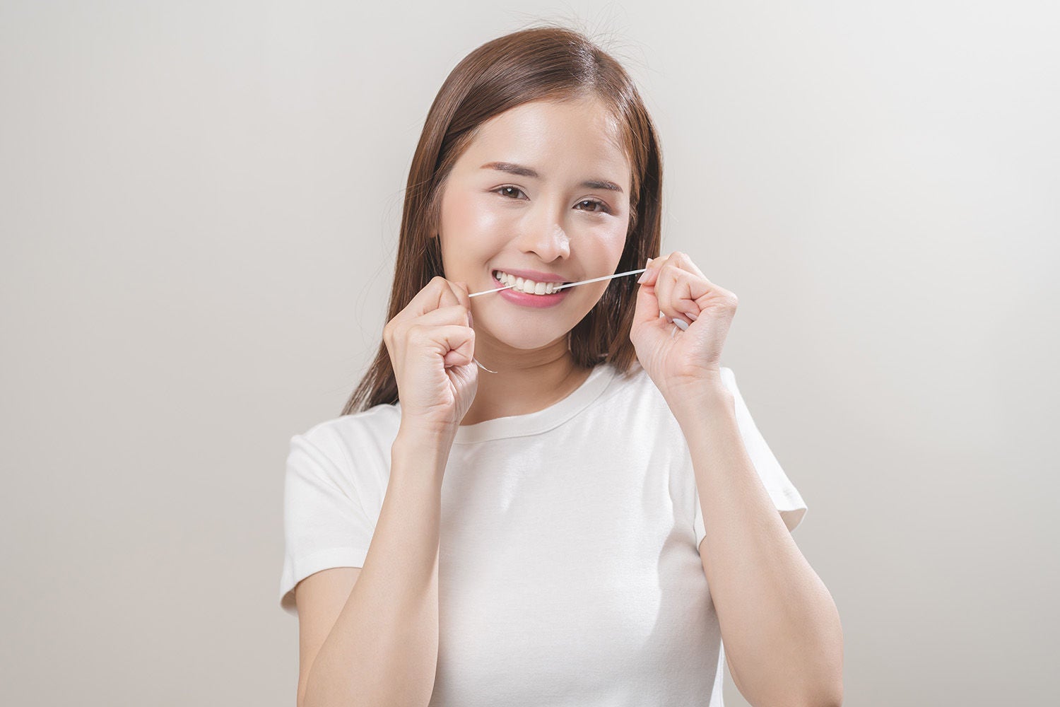 flossing teeth dental care hygiene concept