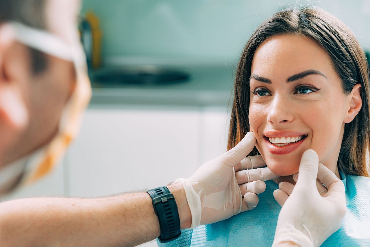 young smiling woman beautifiul teeth having
