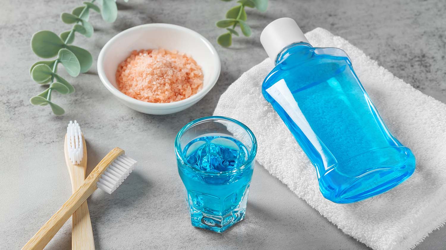 mouthwash glass toothbrush pink salt on